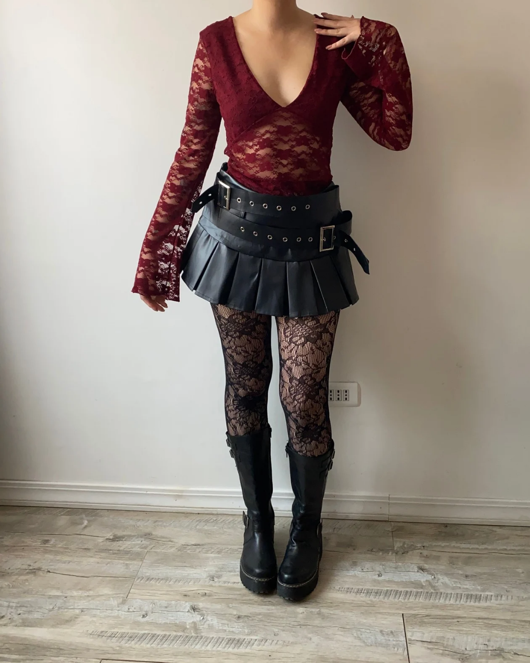Mini falda tableada con cinturón